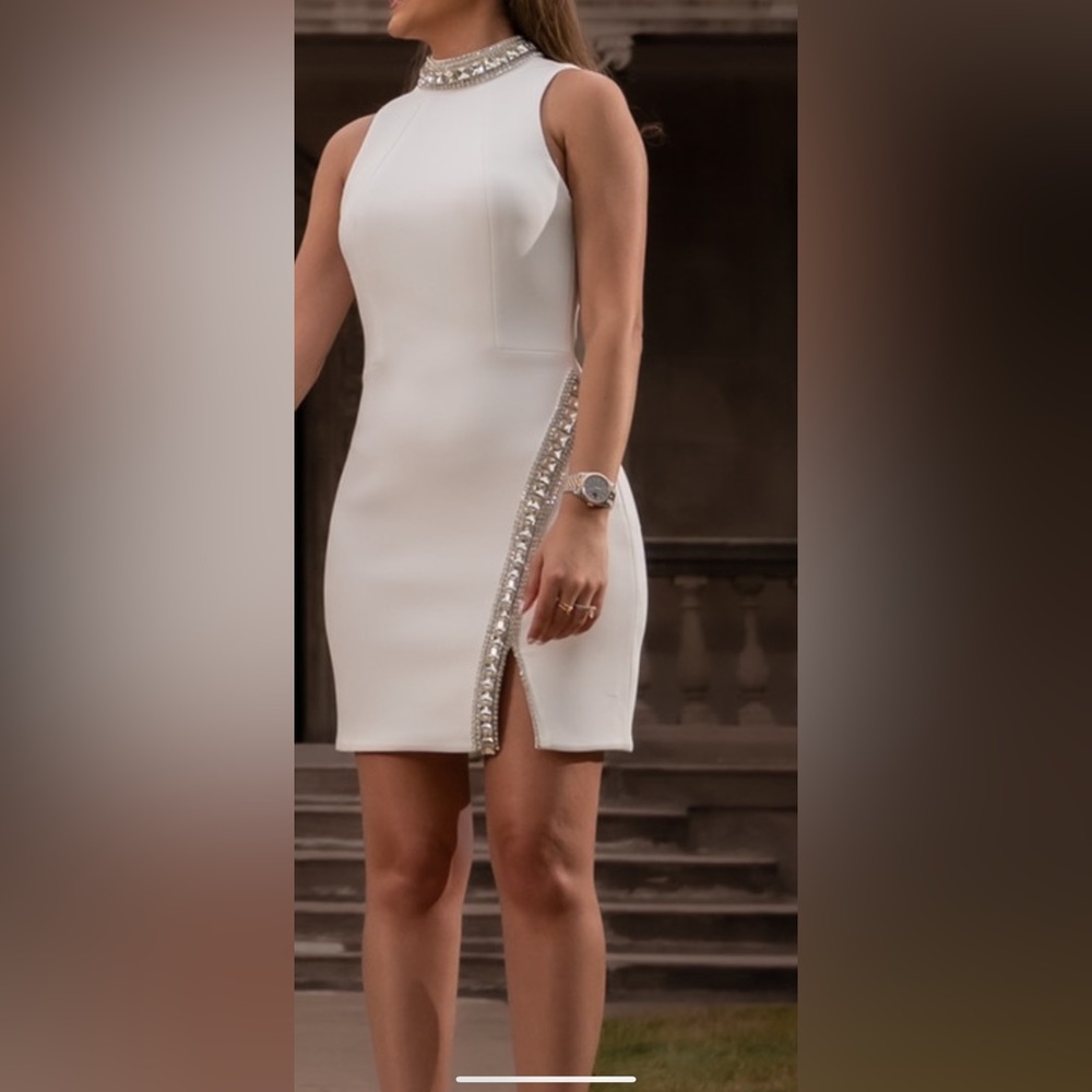 White dress with lots of glitz and glam. Perfect for any bride to be.